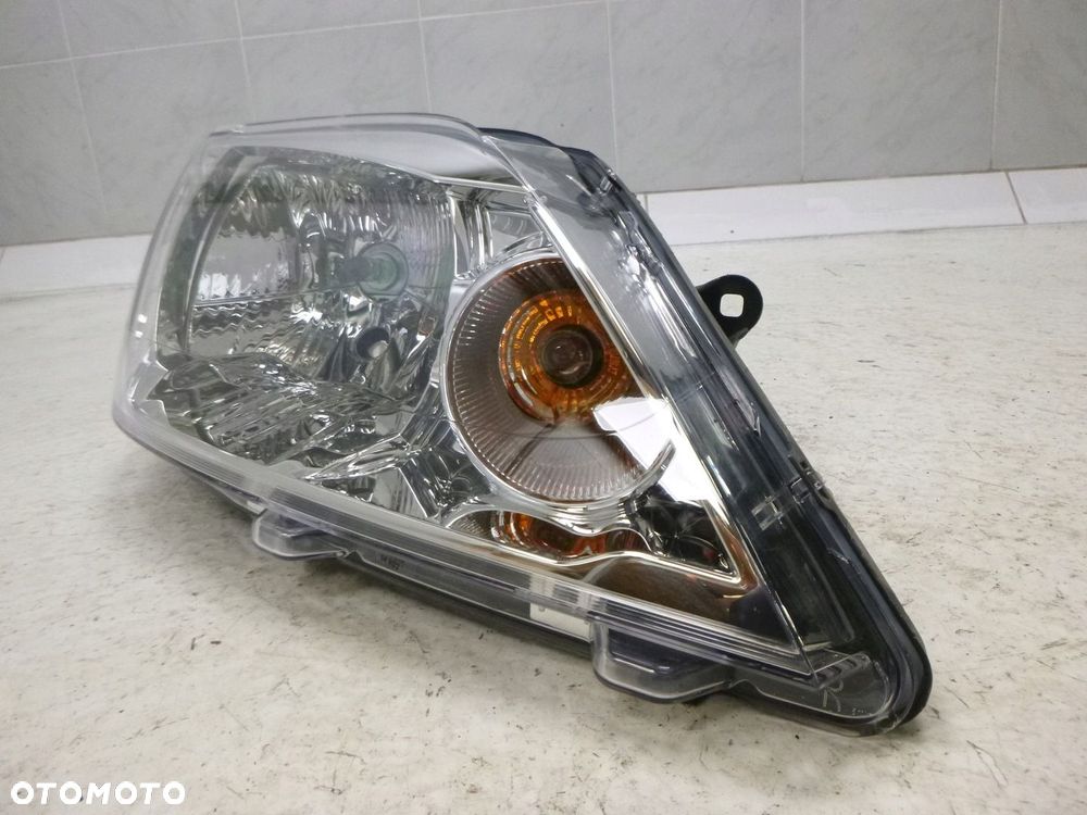 DACIA LOGAN 08-13 LAMPA PRAWY PRZÓDPRZEDNIA ORYGINAŁ - 10