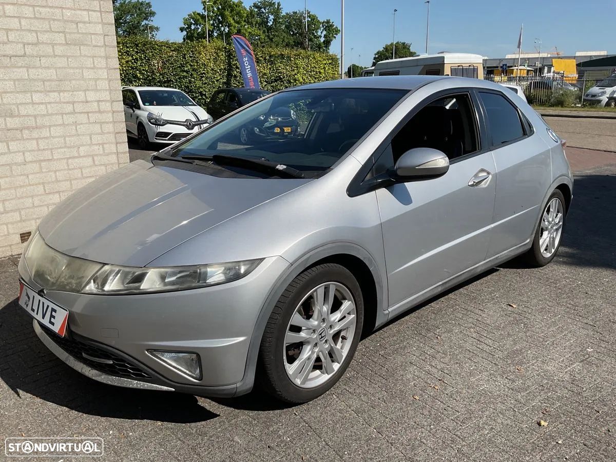 Honda Civic 1.4 i-VTEC Elegance - 1