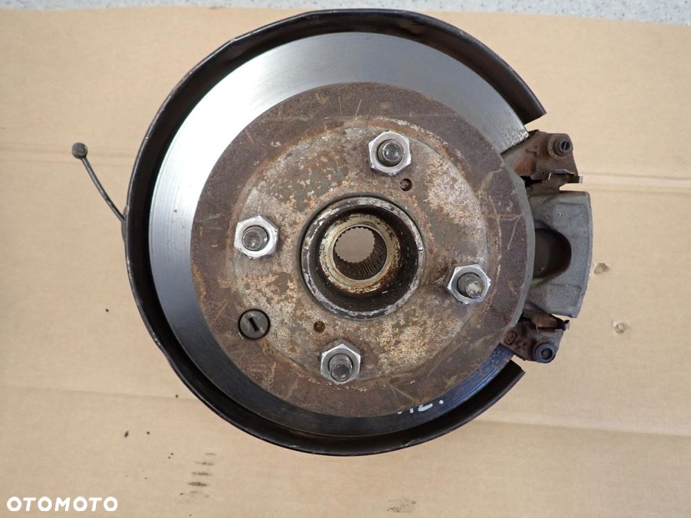 NISSAN 200SX S13 ZWROTNICA TYLNA LEWA ZACISK HAMULCOWY - 1
