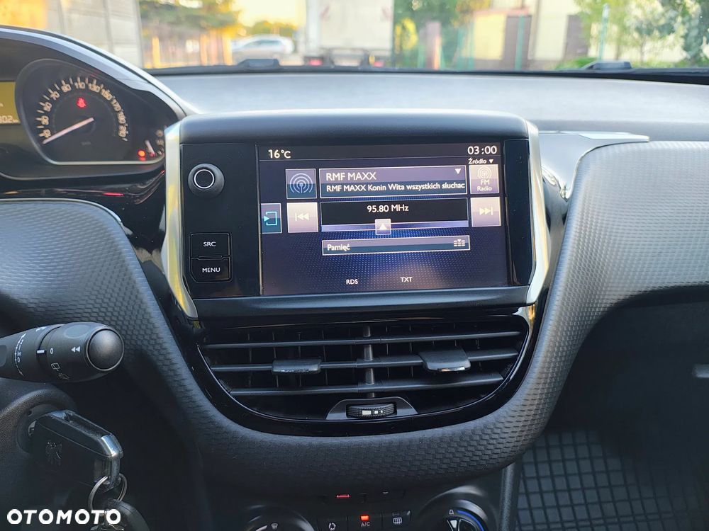 Peugeot 208 1.2 PureTech Style - 31