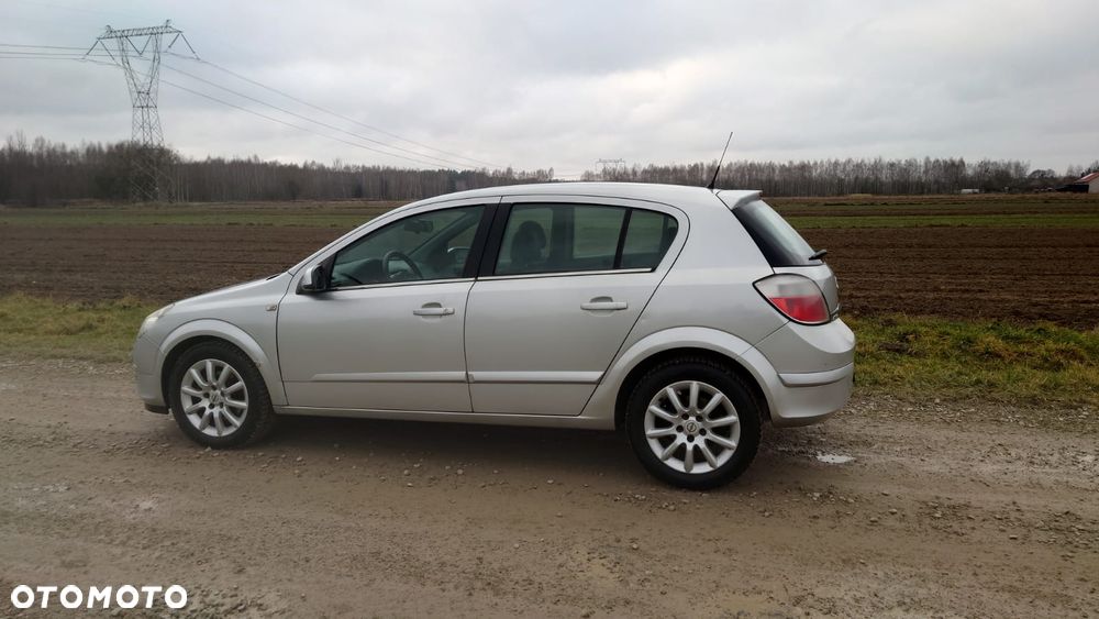 Opel Astra 1.6 Cosmo - 12