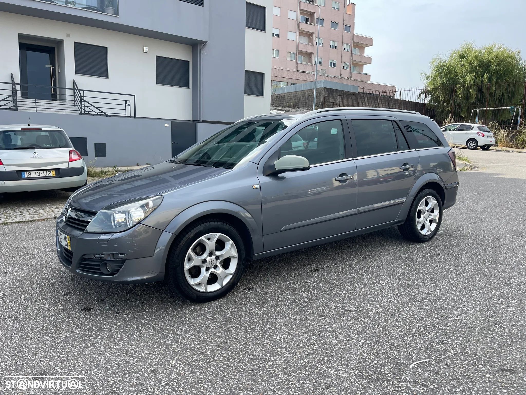 Opel Astra Caravan 1.3 CDTi Cosmo - 1