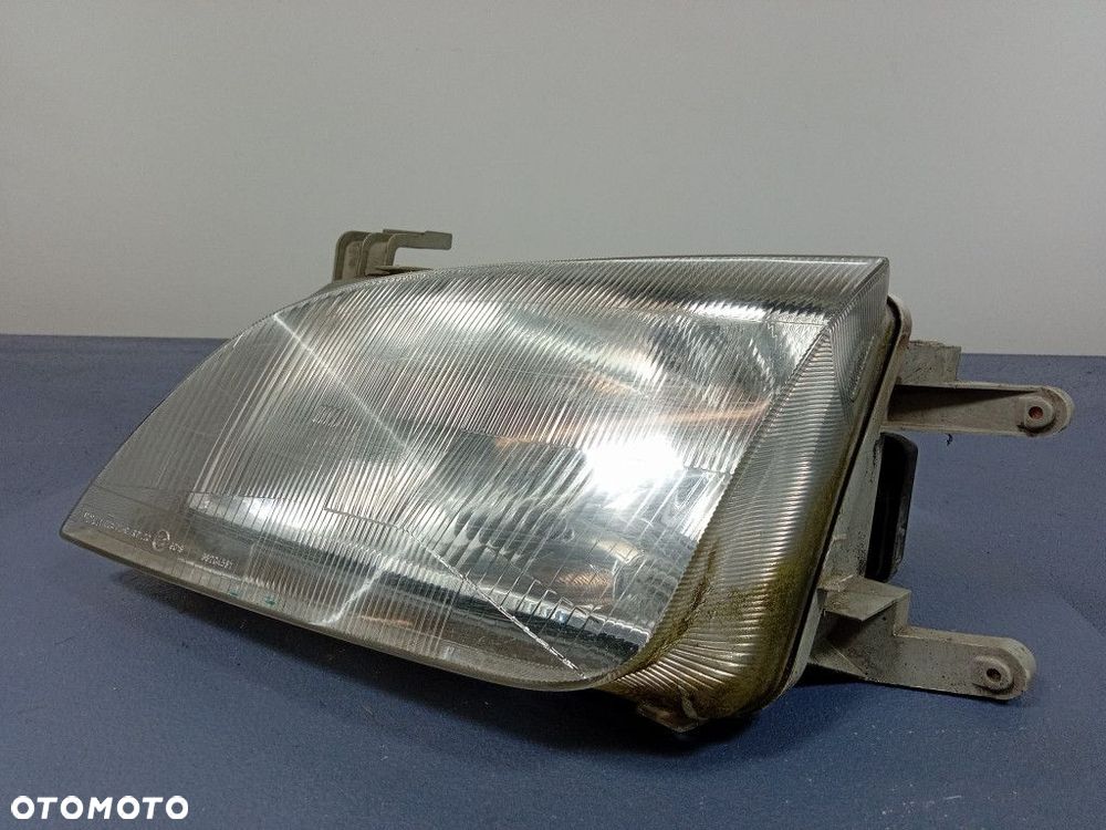SUZUKI SWIFT III 96-04 REFLEKTOR LEWY EU 35300-80E - 2