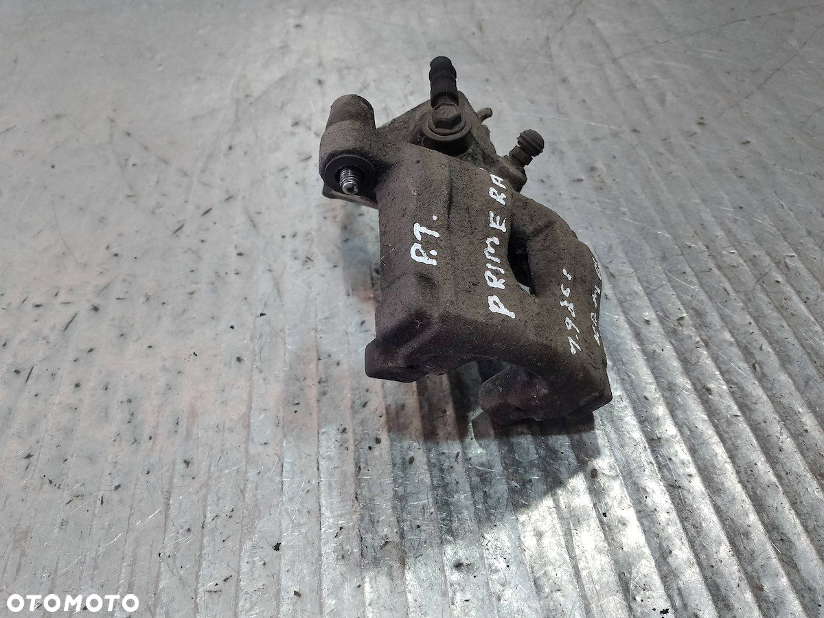 ZACISK HAMULCOWY PRAWY TYŁ NISSAN PRIMERA P12 1.9 - 4