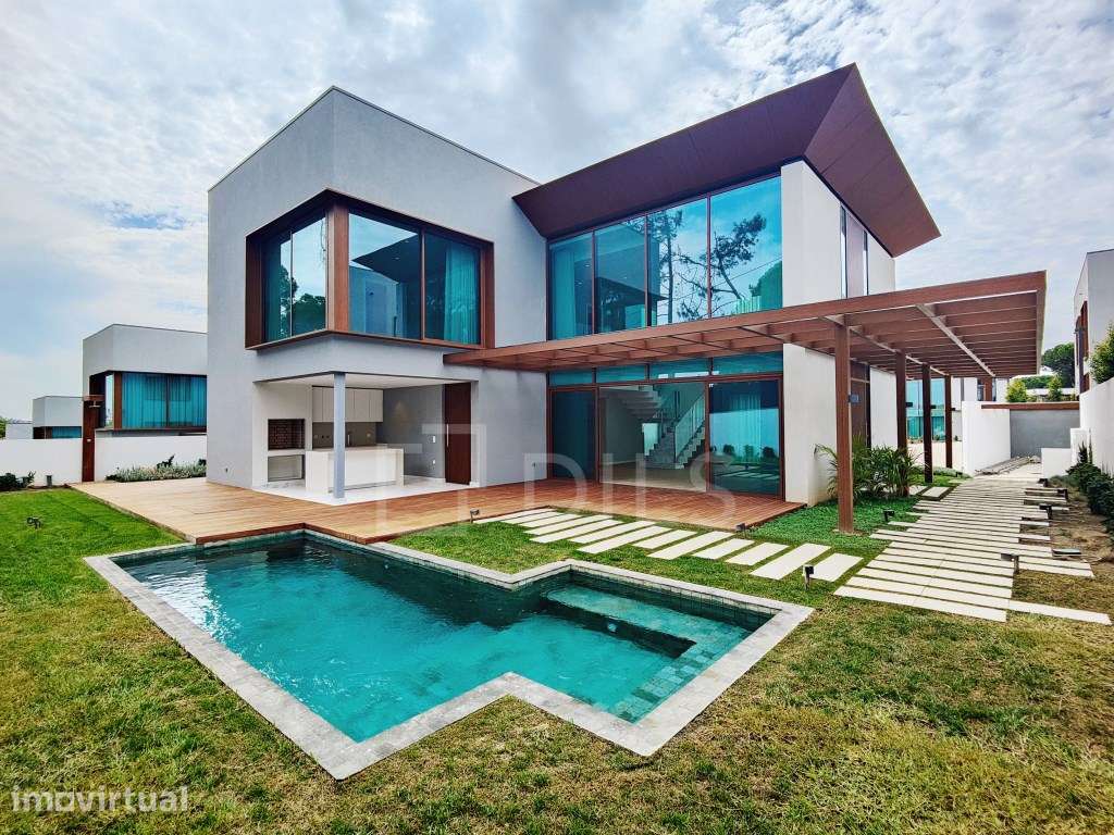 Moradia T4 com jardim e piscina em novo empreendimento no Estoril - Grande imagem: 2/98