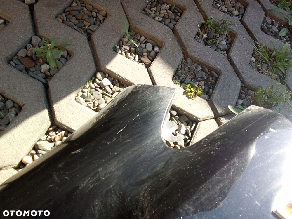 KL BŁOTNIK LEWY PRZÓD OPEL CORSA D 06- 5D - 4