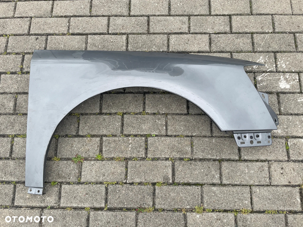 VW PASSAT B6  BŁOTNIK PRAWY LA7T BEZ RDZY