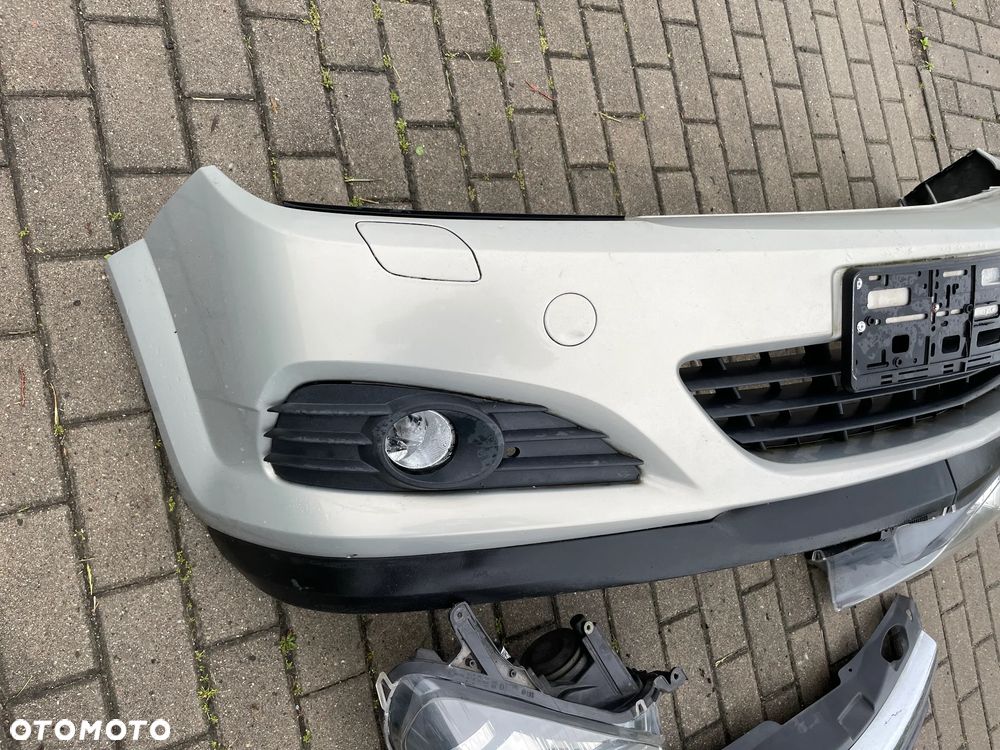 OPEL ASTRA H III LIFT PRZÓD KOMPLETNY ZDERZAK LAMPA REFLEKTOR LEWY przedni GRILL lampa reflektor LEWA PRAWA GTC Hella Z167 - 11