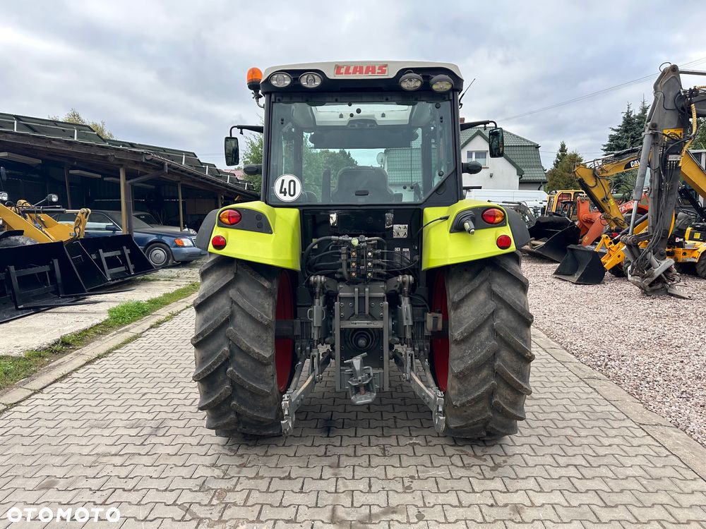 Claas Axos 320 - 3
