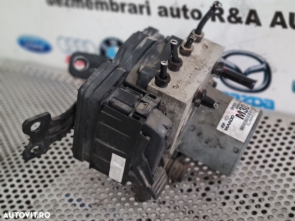 Modul Pompa Unitate ABS Hyundai IX35 Volan Stanga An 2009-2010-2011-2012-2013-2014-2015 Cod 58920-2Y300 Dezmembrez Hyundai IX35 2.0 Benzina 2x4 Cod Motor G4KD An 2009-2010-2011-2012-2013-2014-2015 Volan Stanga - 5