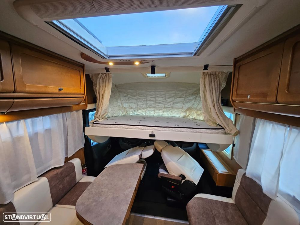 Rapido Le Randonneur 9097F CHASSI AL-KO Cama transversal + BASCULANTE - 51