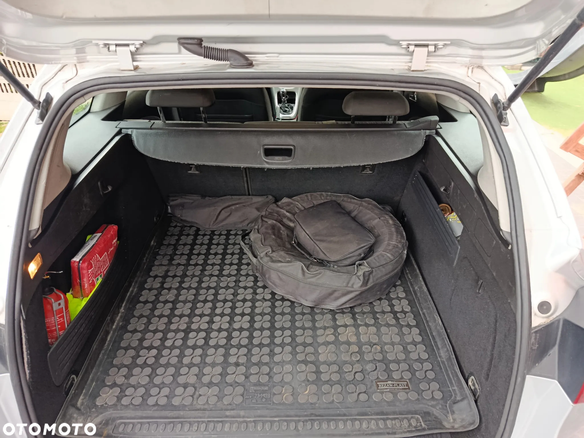 Opel Astra IV 1.4 T Sport - 11