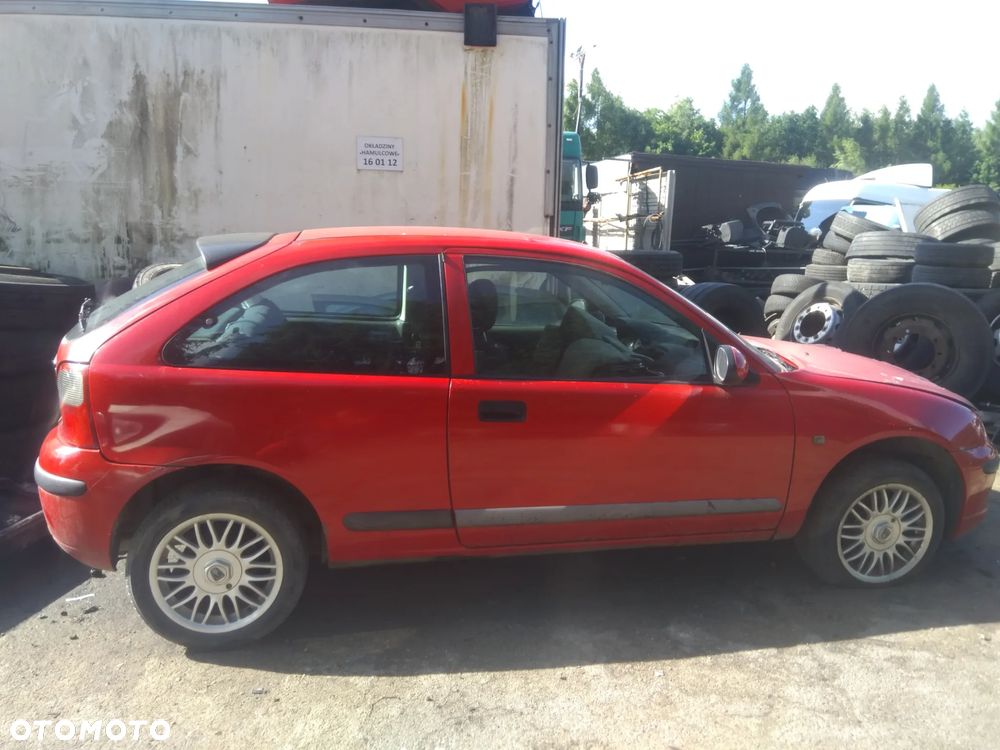 Auto na części - Rover 25 103KM benzyna 2004 Silnik Skrzynia Drzwi Maska Klapa Błotnik Zderzak Lampa Szyba Klamka Lusterko Deska Kokpit - 2
