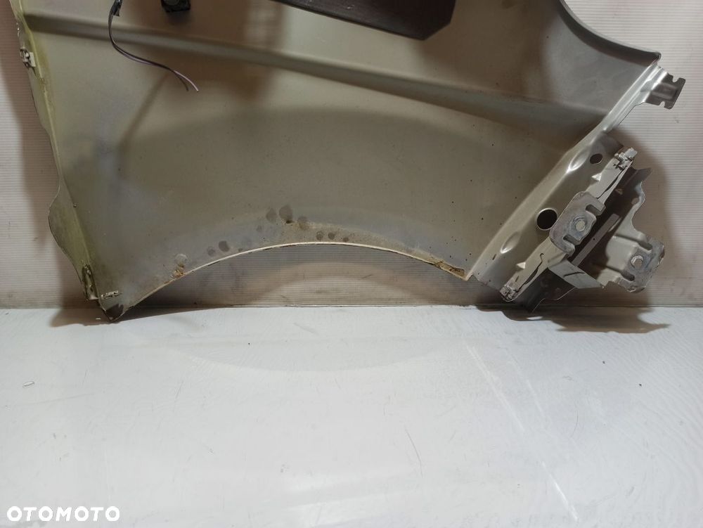 BŁOTNIK LEWY PRZEDNI OPEL VIVARO A - 9