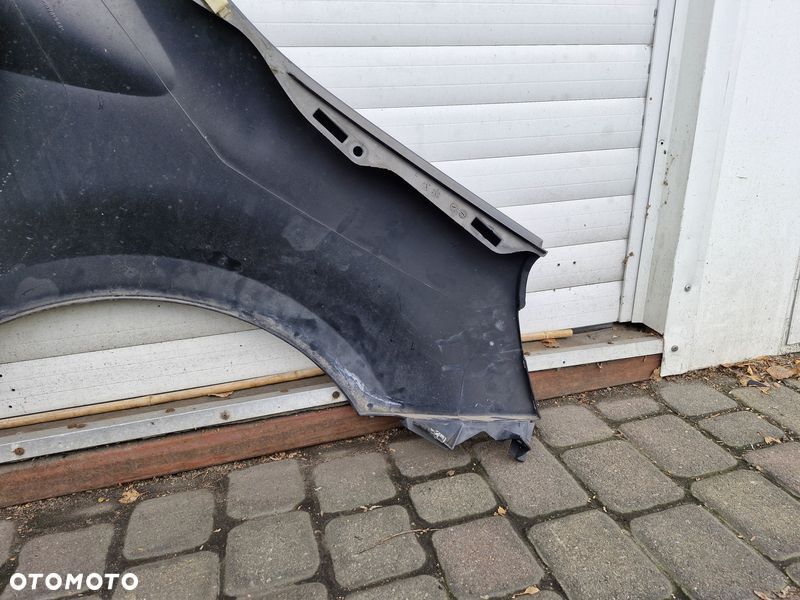 RENAULT MODUS BŁOTNIK LEWY PRZÓD PRZEDNI - 9