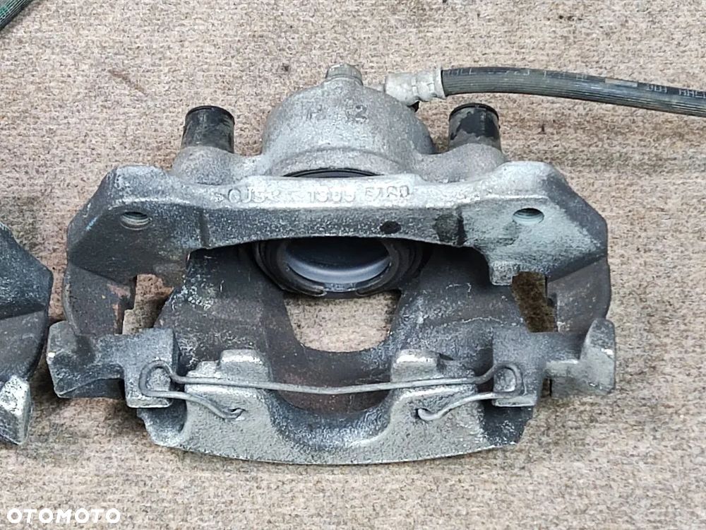 TOYOTA YARIS 1.5h 1.5i 19-24r Zacisk Hamulcowy Przód Prawy Lewy - 10
