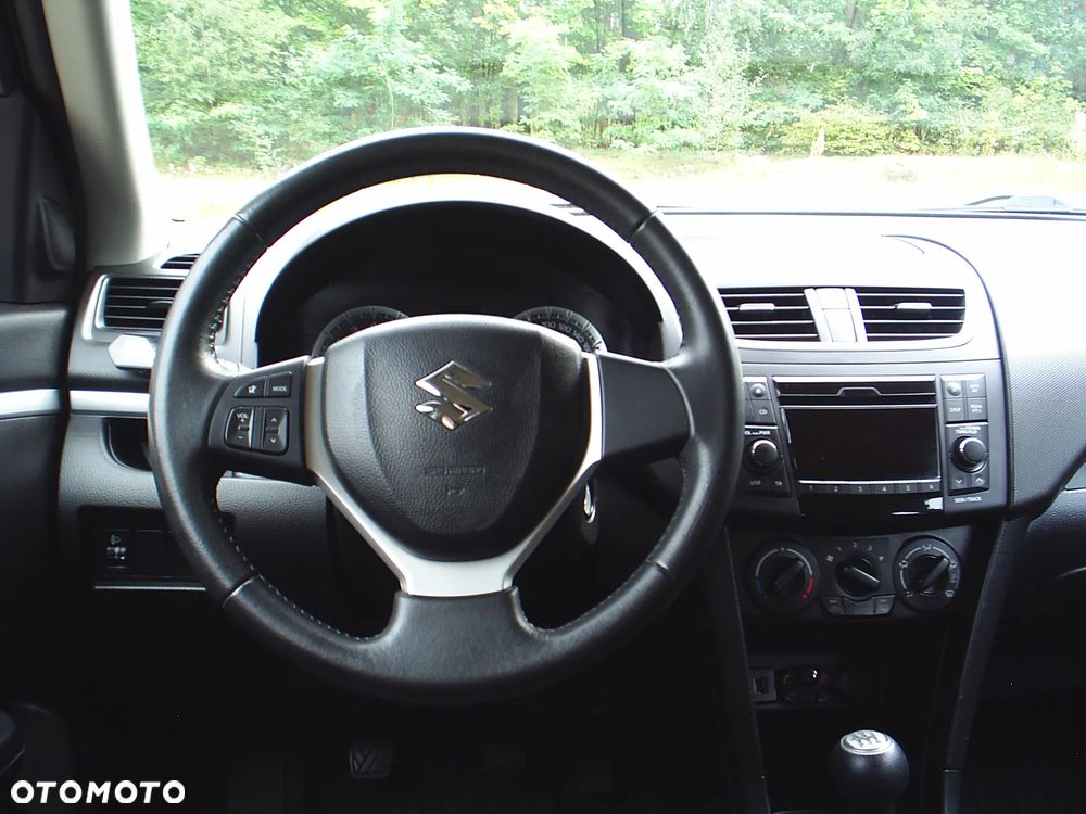 Suzuki Swift 1.2 4x4 Club - 8