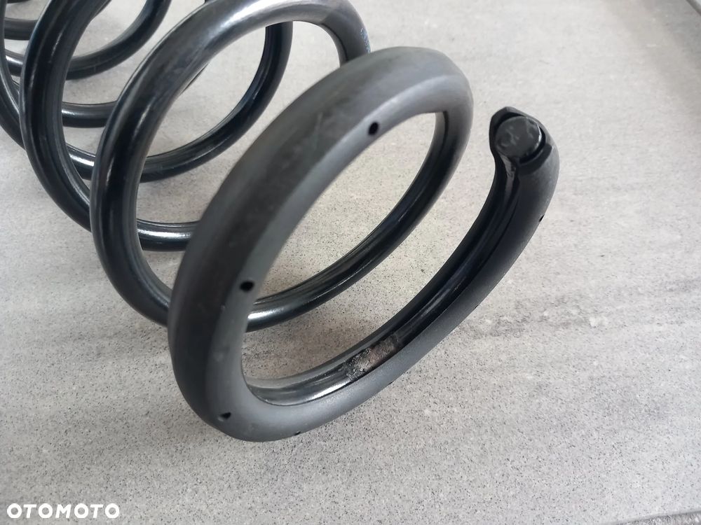 Sprężyna zawieszenia tylna Ford Escort 1990-1995 6991166 - 3