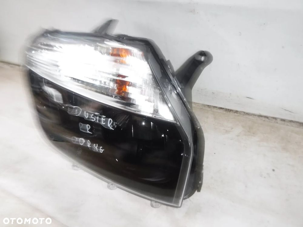dacia duster 1 lampa przód prawa nowa oryginał przednia - 5