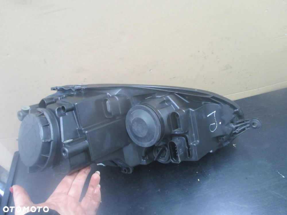 lampa lewa Golf V JETTA Hella Europa - 4