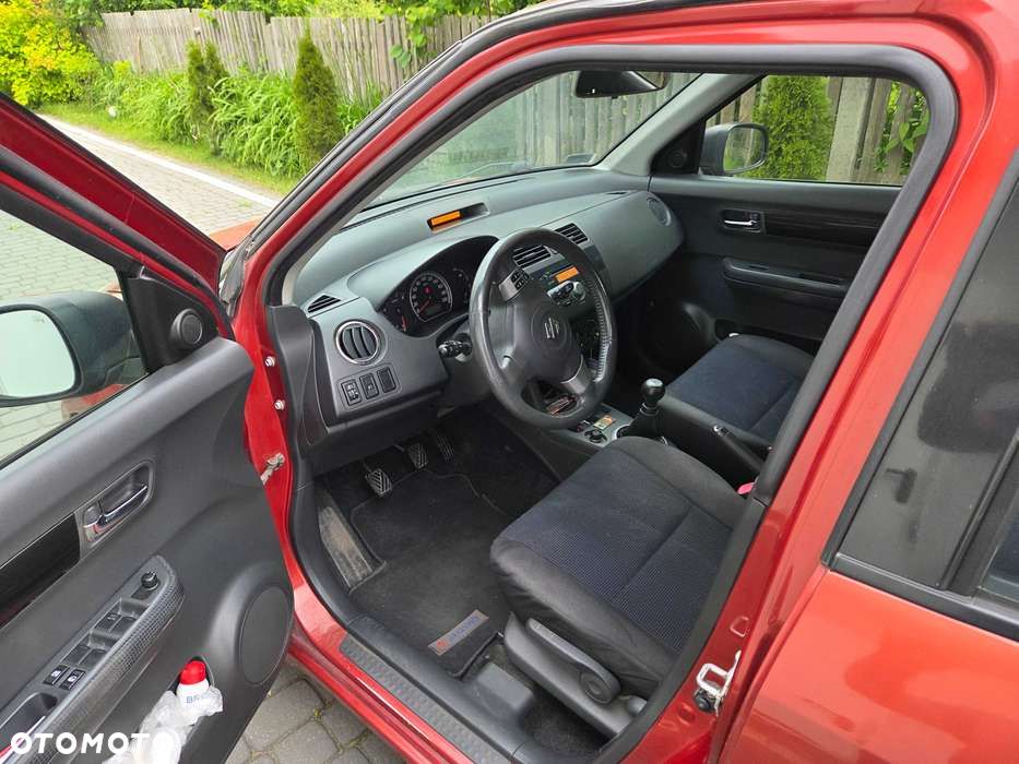 Suzuki Swift 1.3 Club - 4