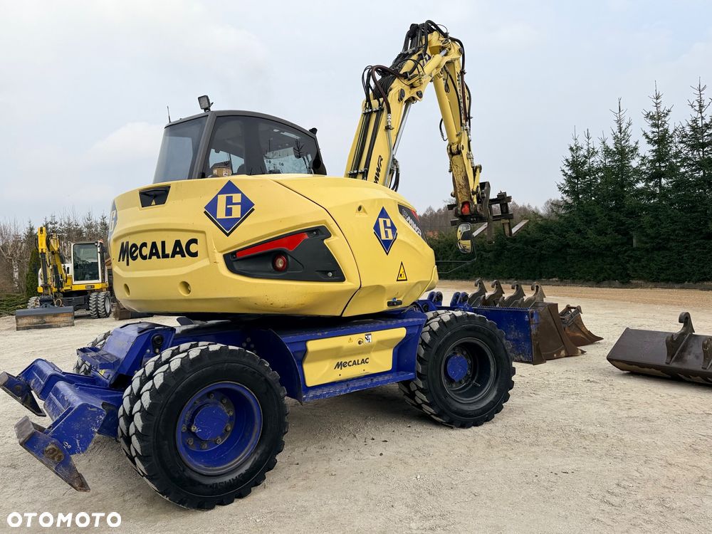 Mecalac Koparka 14 ton MECALAC 15 MWR koparko-ładowarka 3 łyżki widły 1 wł Centr.smarowanie Opony na BLIŹNIAKU 80%Camso ładowarka 714 12MTX 4x4 skrętne KLIMA kabina Premium silnik 146KM volvo EW140B DEUTZ szybka 35km/h - 32