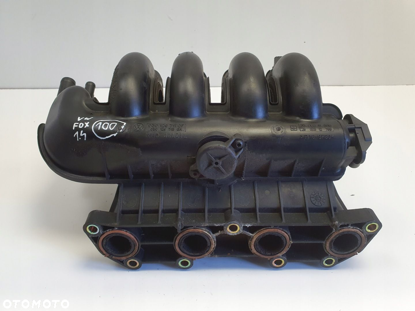 VW Fox 1.4 B KOLEKTOR SSĄCY 030129711CF - 3