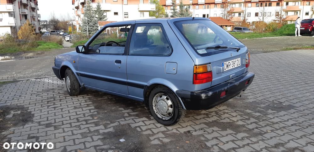 Nissan Micra 1.0 GL - 7