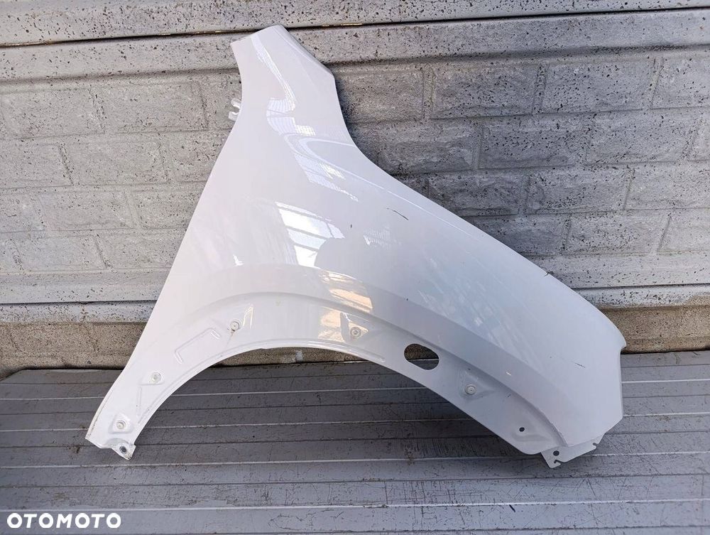 DACIA SPRING 2021- BŁOTNIK PRZEDNI PRAWY ORYGINAŁ