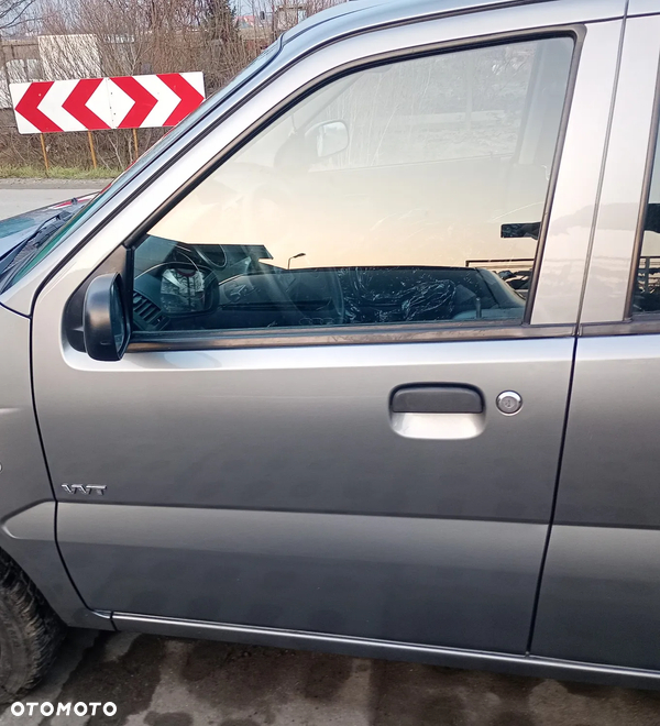 SUZUKI IGNIS II 04-08 ZCD drzwi lewe przednie lewy przód
