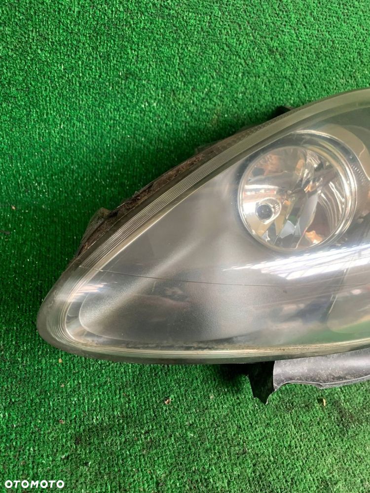 Lampa przód przednia lewa Fiat Croma II Lift Bravo II 51816979 WWA - 2