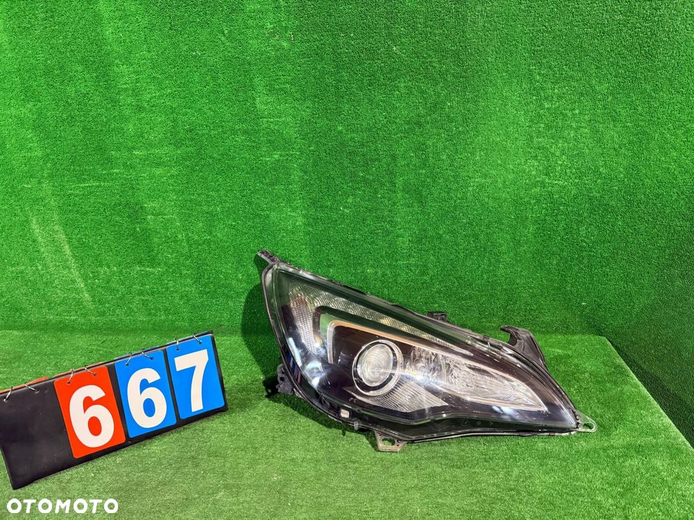 REFLEKTOR PRAWY OPEL ASTRA J GTC XENON NR:667 - 1