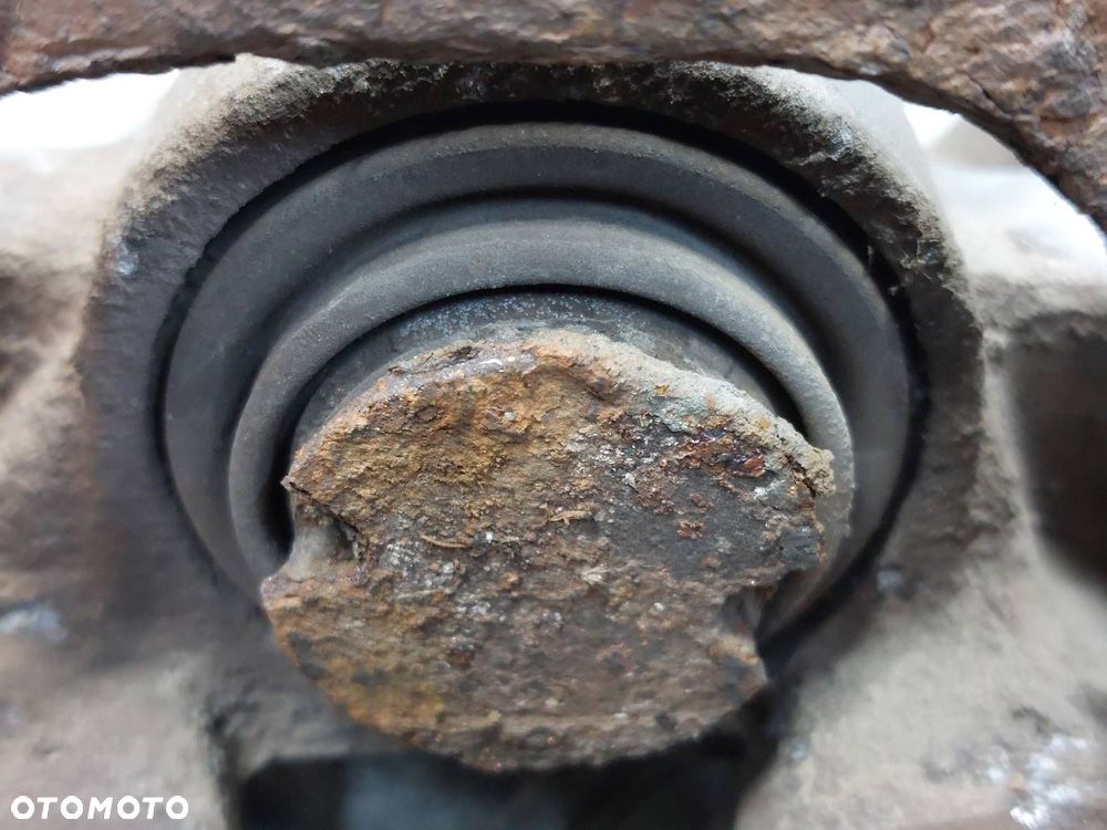 ZACISK HAMULCOWY LEWY + PRAWY TYŁ ASTRA G ZAFIRA A - 7