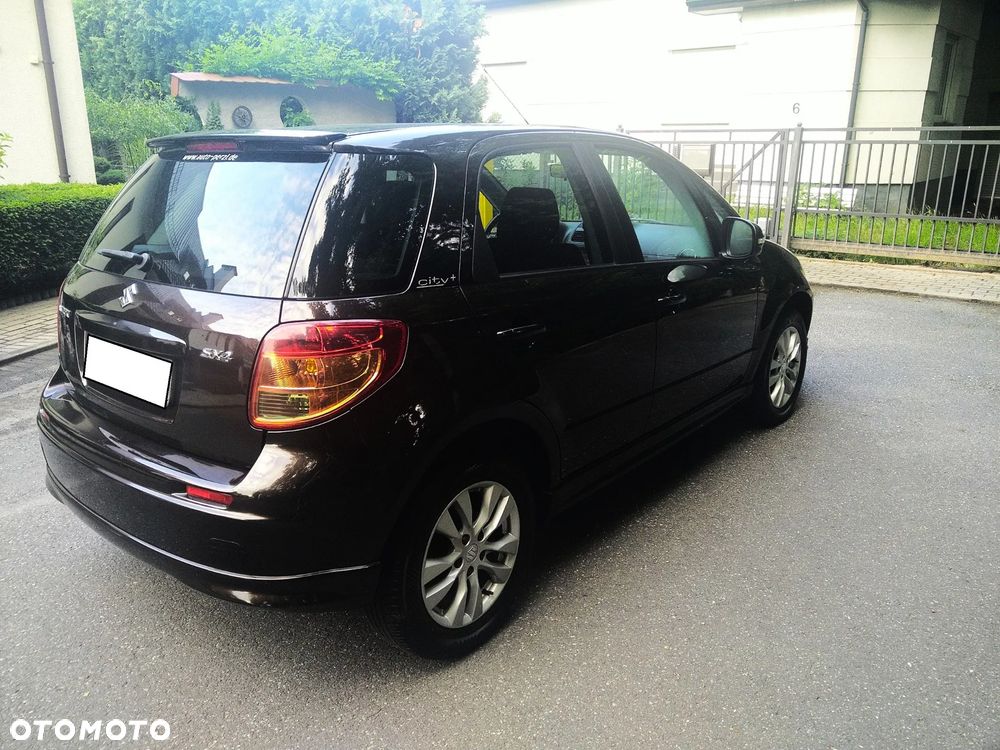 Suzuki SX4 1.6 Comfort Plus - 12