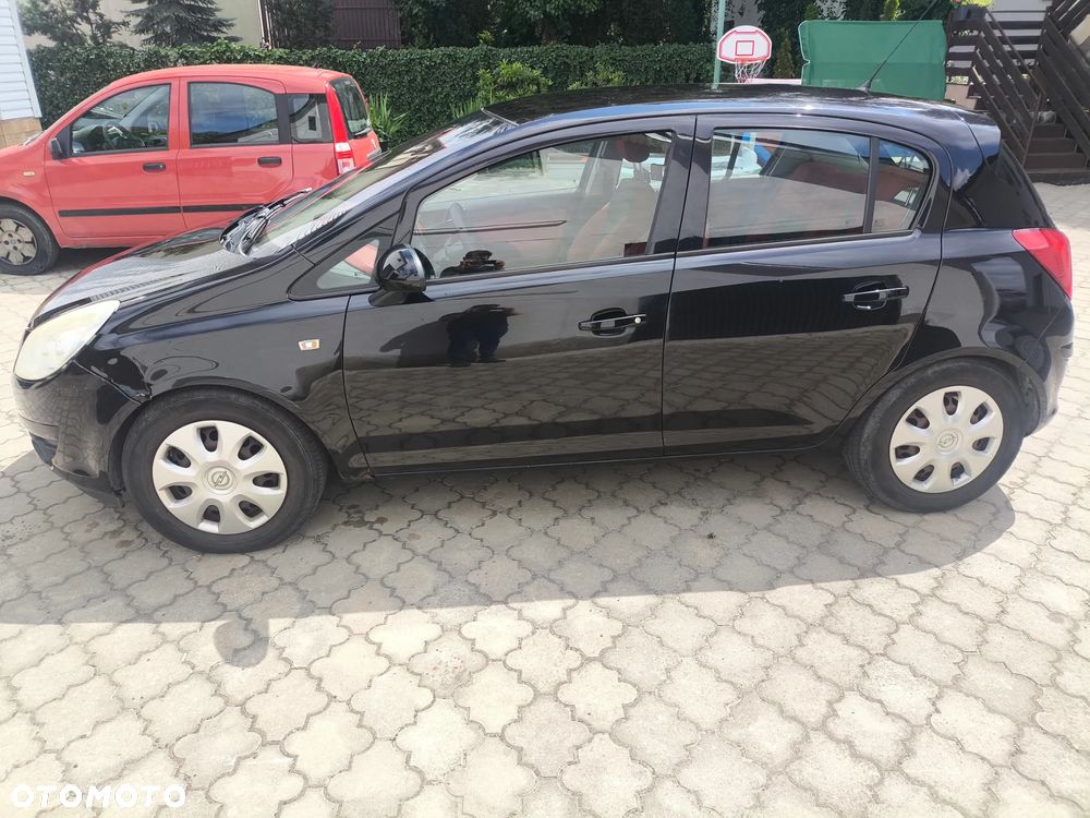 Opel Corsa 1.4 16V Enjoy - 10