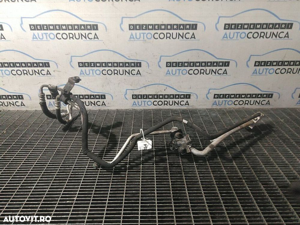 Conducta AC Hyundai Tucson 2006 - 2010 G4GC (1254) - 2