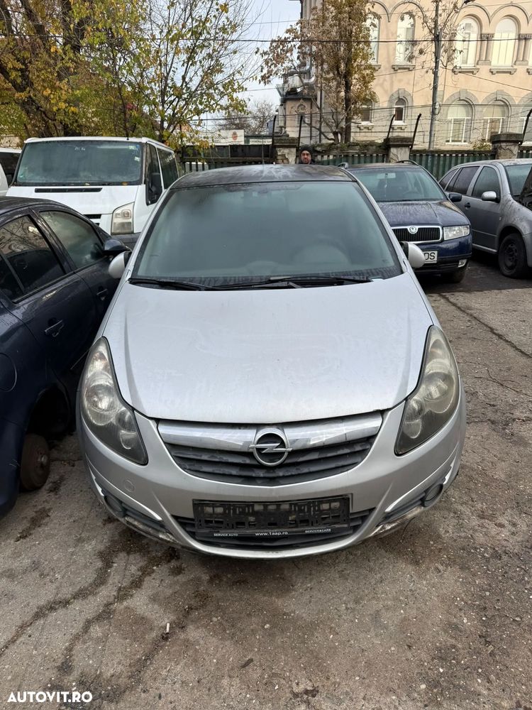 Dezmembrez Opel Corsa D gri argintiu 1,3 CDTI 4usi 2007 - 10