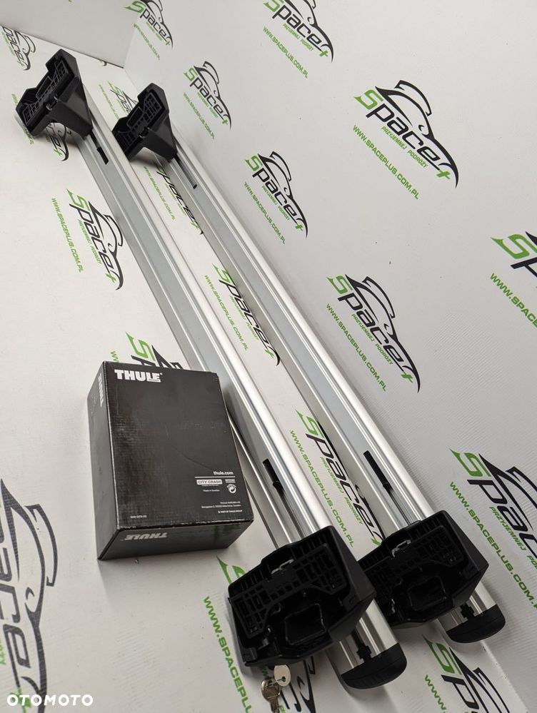 Bagażnik dachowy Thule: belki 711300 + Stopy 7105 + kit - 7
