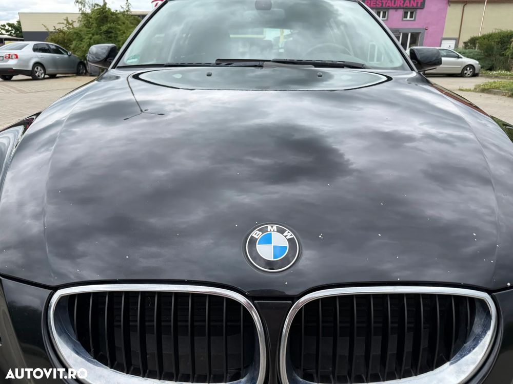 BMW 5 Series 2009 — imagine 12