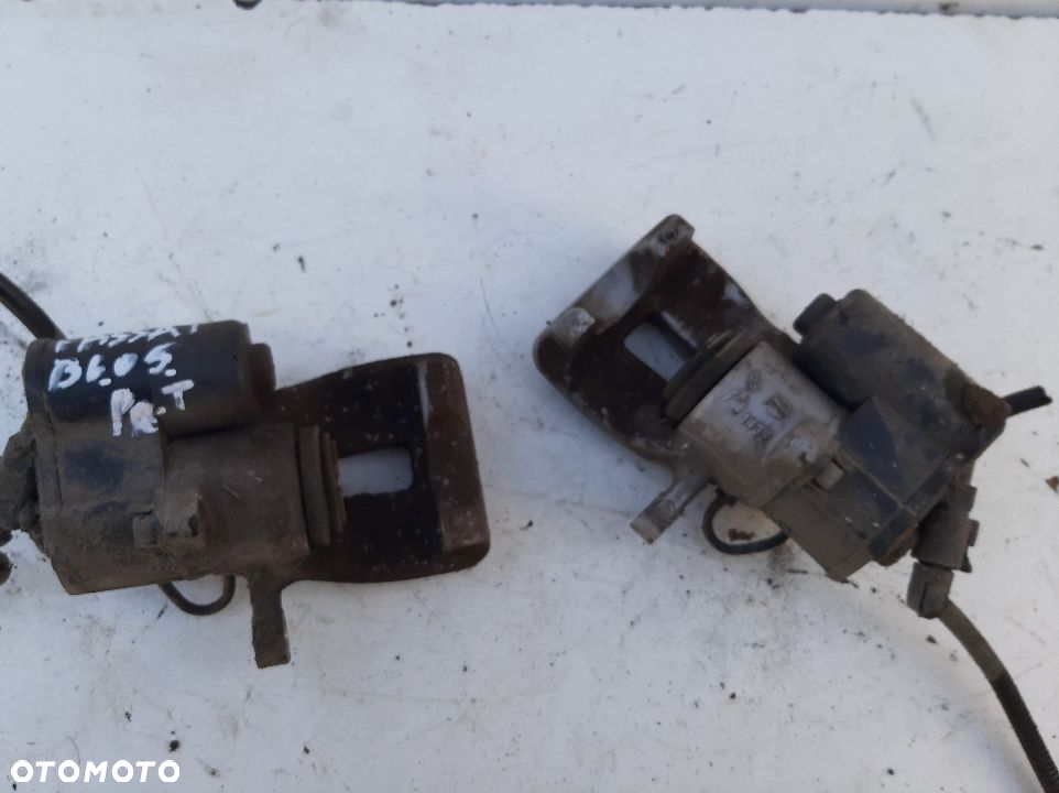 ZACISK HAMULCOWY PRAWY TYLNY VW PASSAT B6 - 4