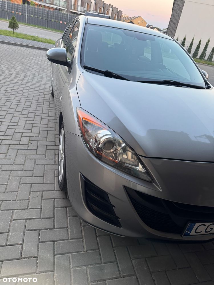 Mazda 3 2.0 Exclusive + - 8