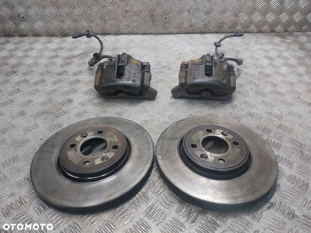 TARCZE HAMULCOWE PRZÓD + ZACISKI RENAULT MEGANE I LIFT 1.6 16V - 1