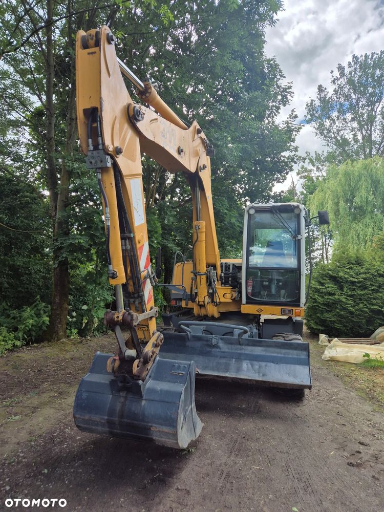 Liebherr A 311 Litronic - 3
