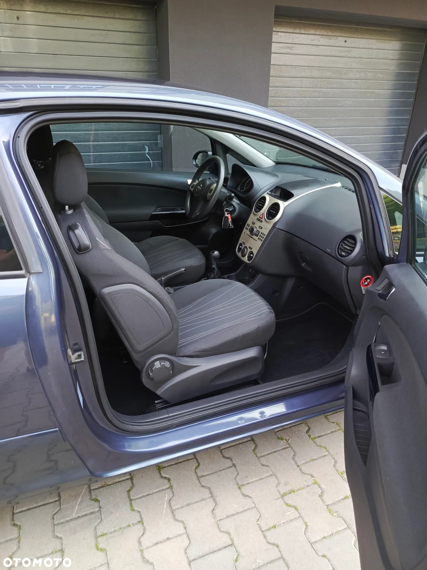 Opel Corsa 1.4 16V Cosmo - 12