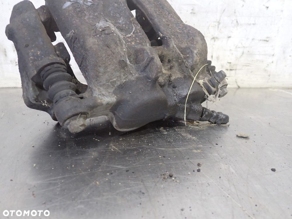 ZACISK HAMULCA PRAWY PRZÓD RENAULT TRAFIC II 1.9 - 2