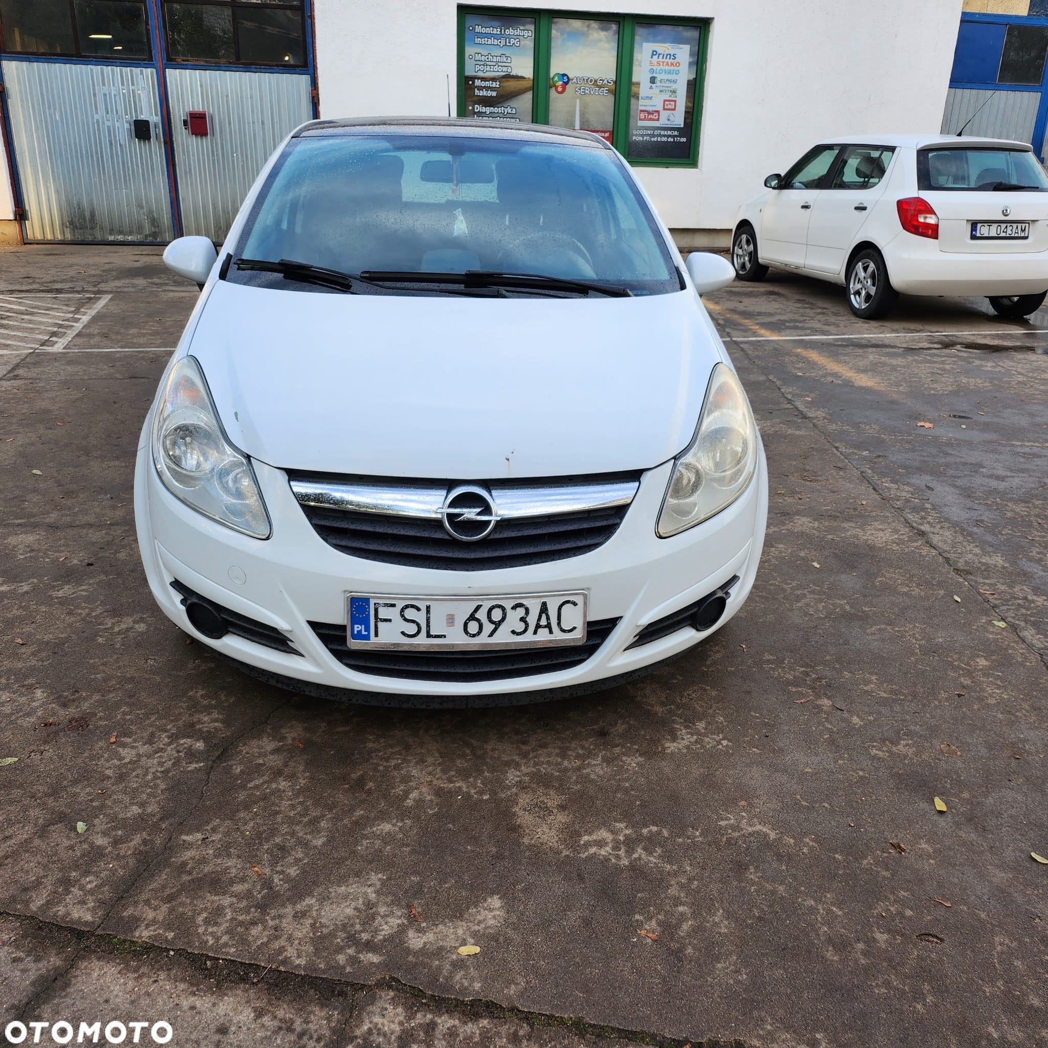 Opel Corsa 1.2 16V Cosmo - 11