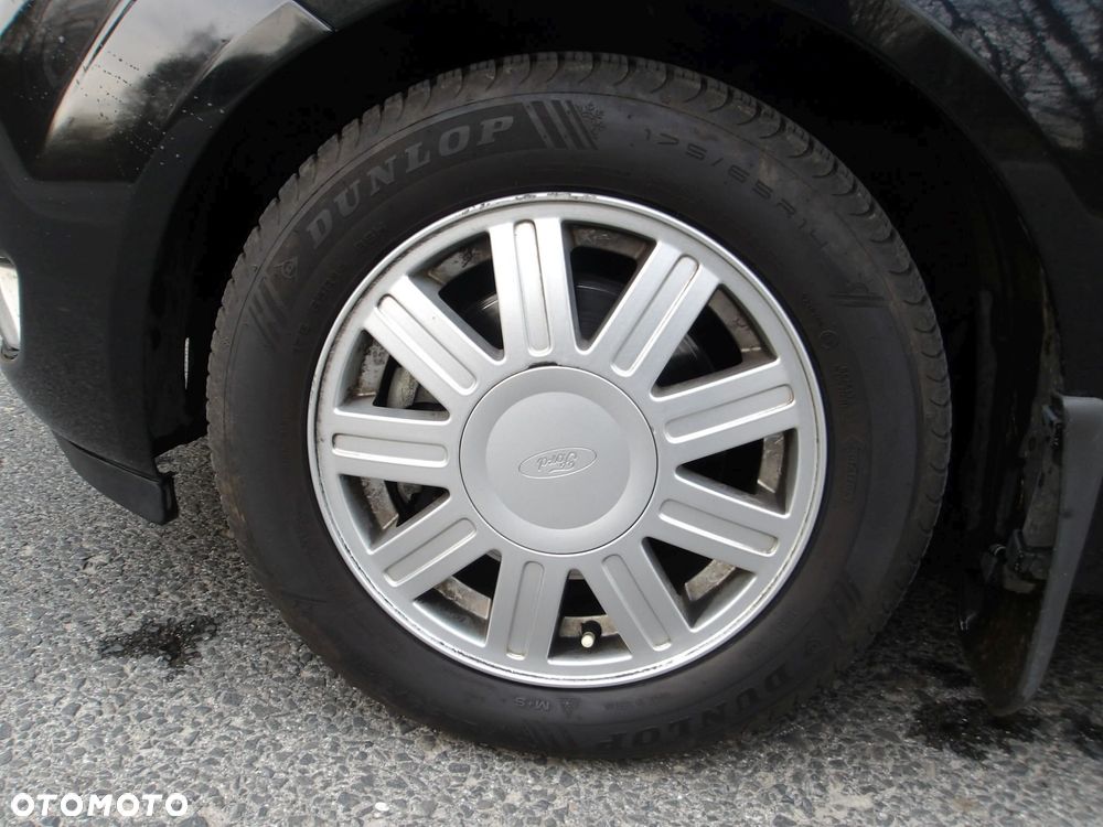 Ford Fiesta 1.4 Ghia - 34