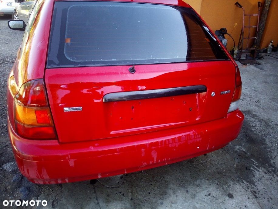 Mazda 323 323p BA Błotnik przedni Lewy Prawy SU - 4