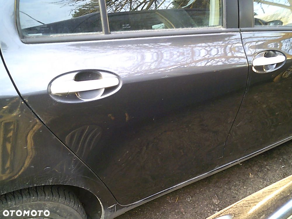 DRZWI PRAWE TYLNE  TOYOTA YARIS II 1G3 - 1