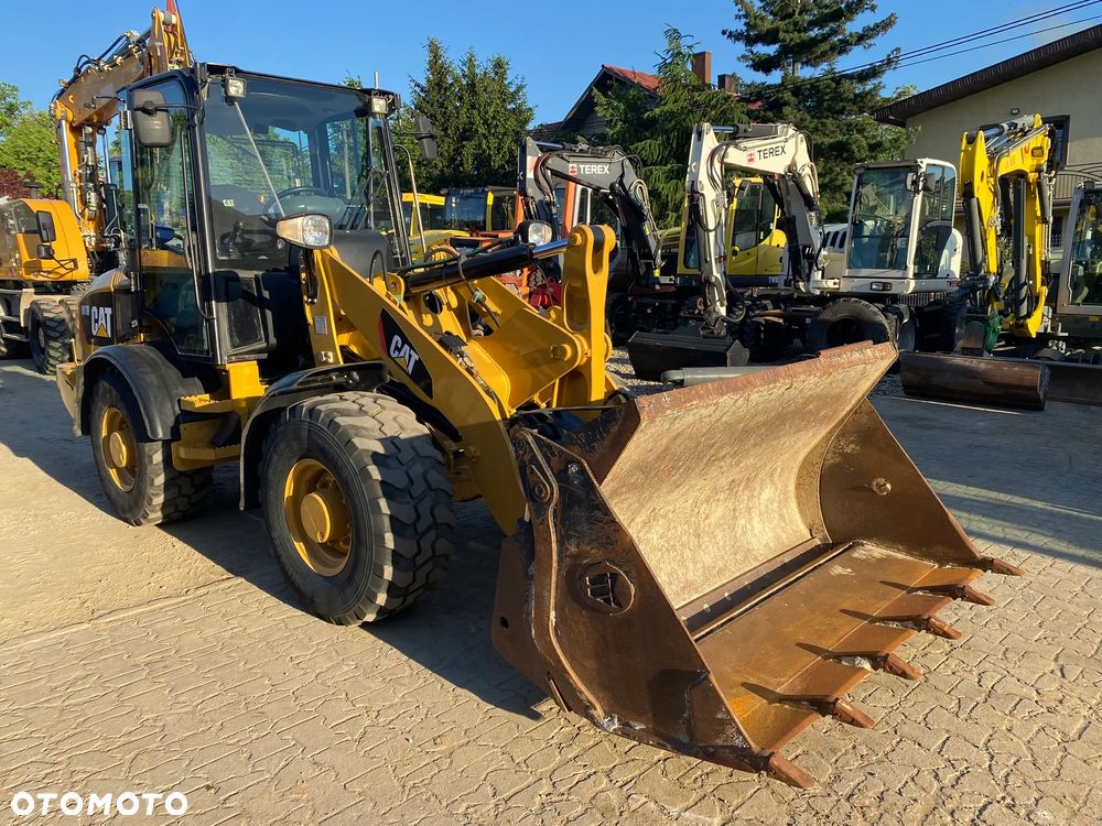 Caterpillar CAT 907H, 2012 ROK, ŁYŻKA OTWIERANA + WIDŁY, z NIEMIEC - 9